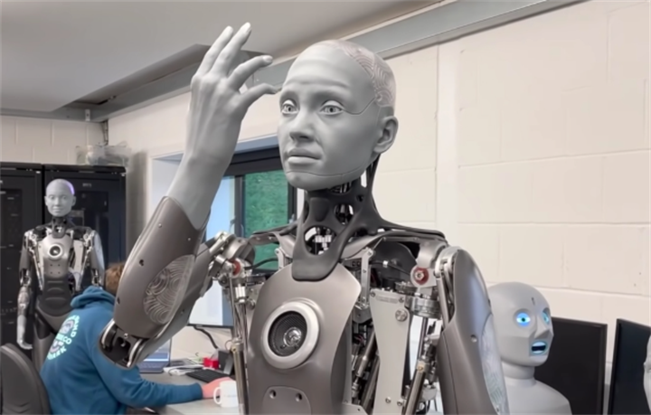 Human-like humanoid robot prototype in robotics lab testing workspace