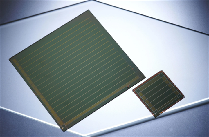 Two perovskite solar wafer samples of different sizes on flat substrate