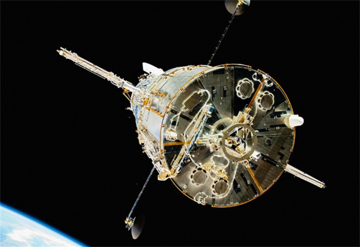 Complex multi-instrument satellite floating in low Earth orbit for on-orbit repair and space production missions