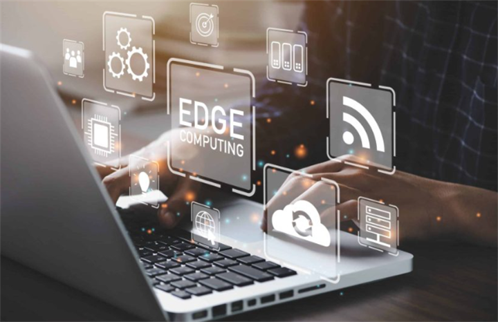 Hands typing on laptop with edge computing digital interface